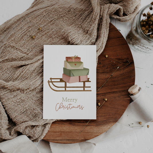 Carte de Noël traîneau cadeaux - Carte postale de Noël