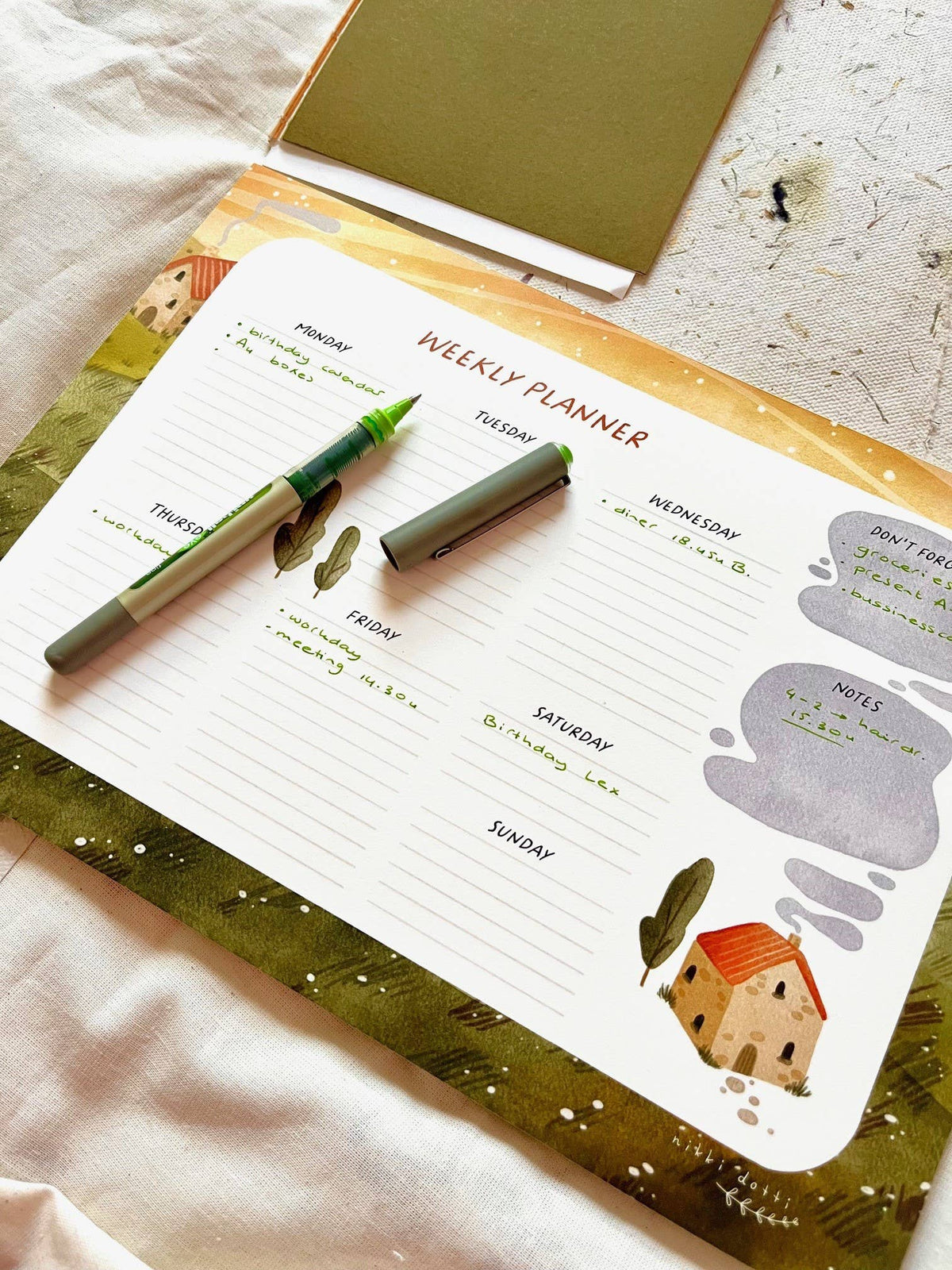 Weekly planner with nice motif by Nikki Dotti
