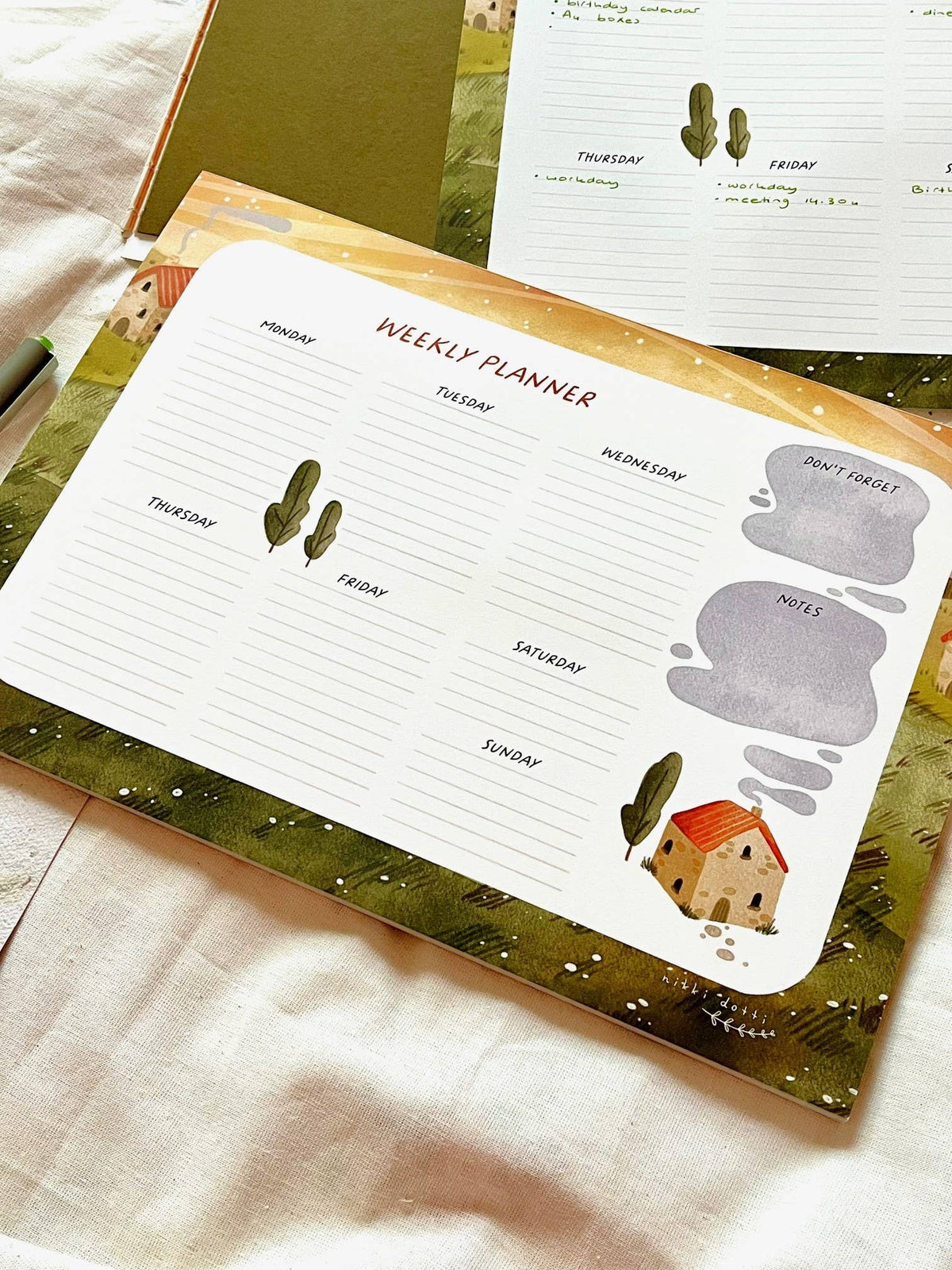 Weekly planner with nice motif by Nikki Dotti