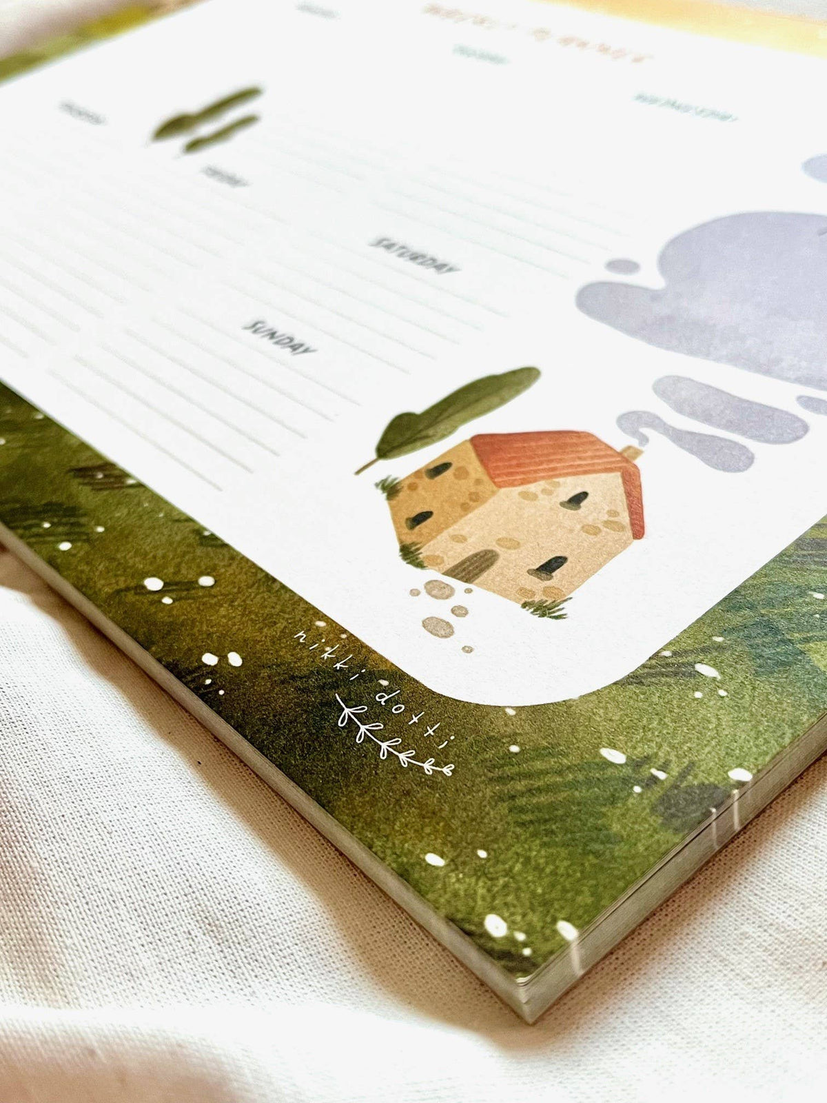 Weekly planner with nice motif by Nikki Dotti