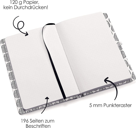 Bullet Journal dot grid with black and white leaves